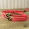 bracelet bronze breloque florale cordon cuir fuchsia